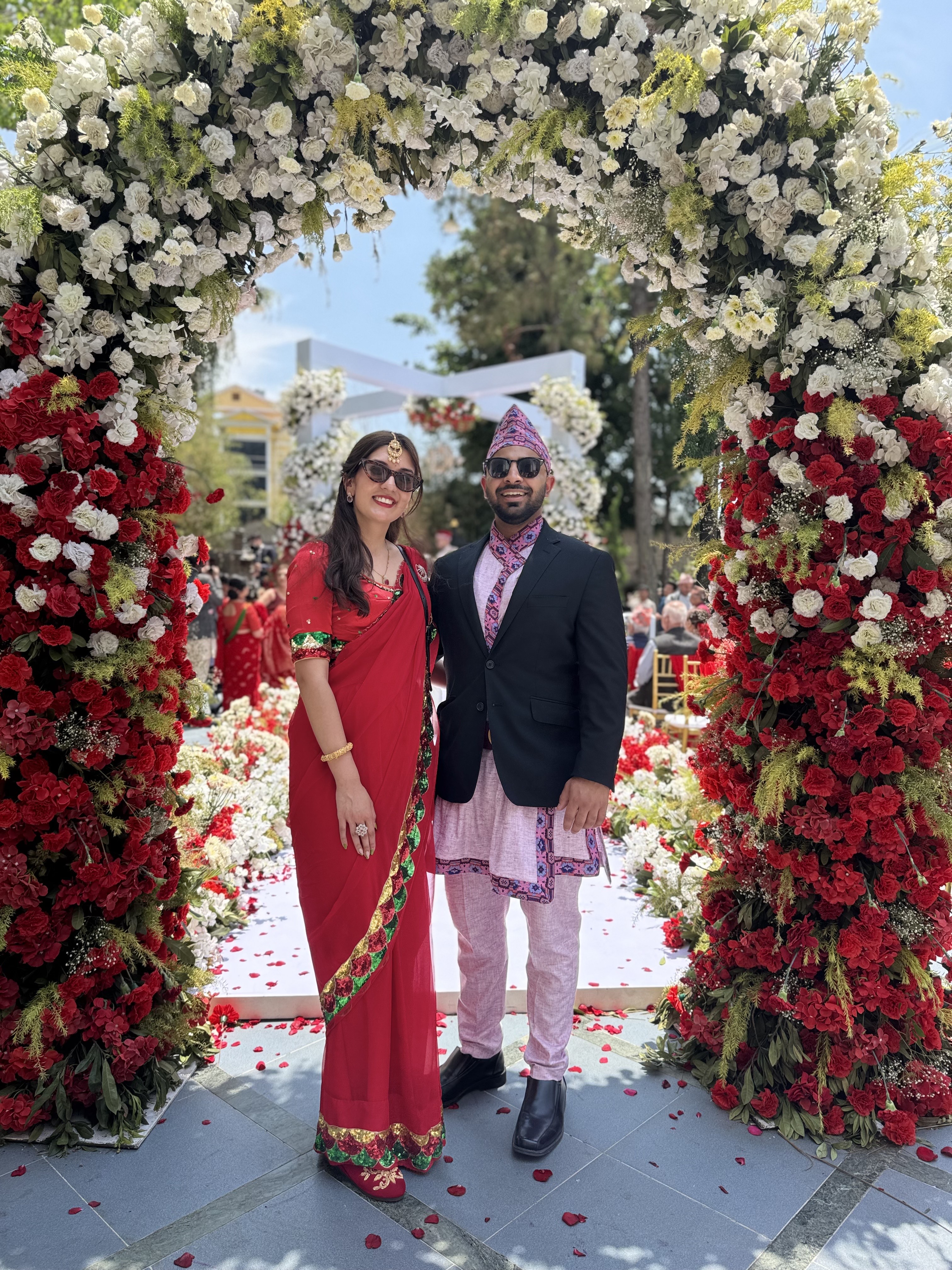 Simran and Parth dressed up together at a wedding celebration